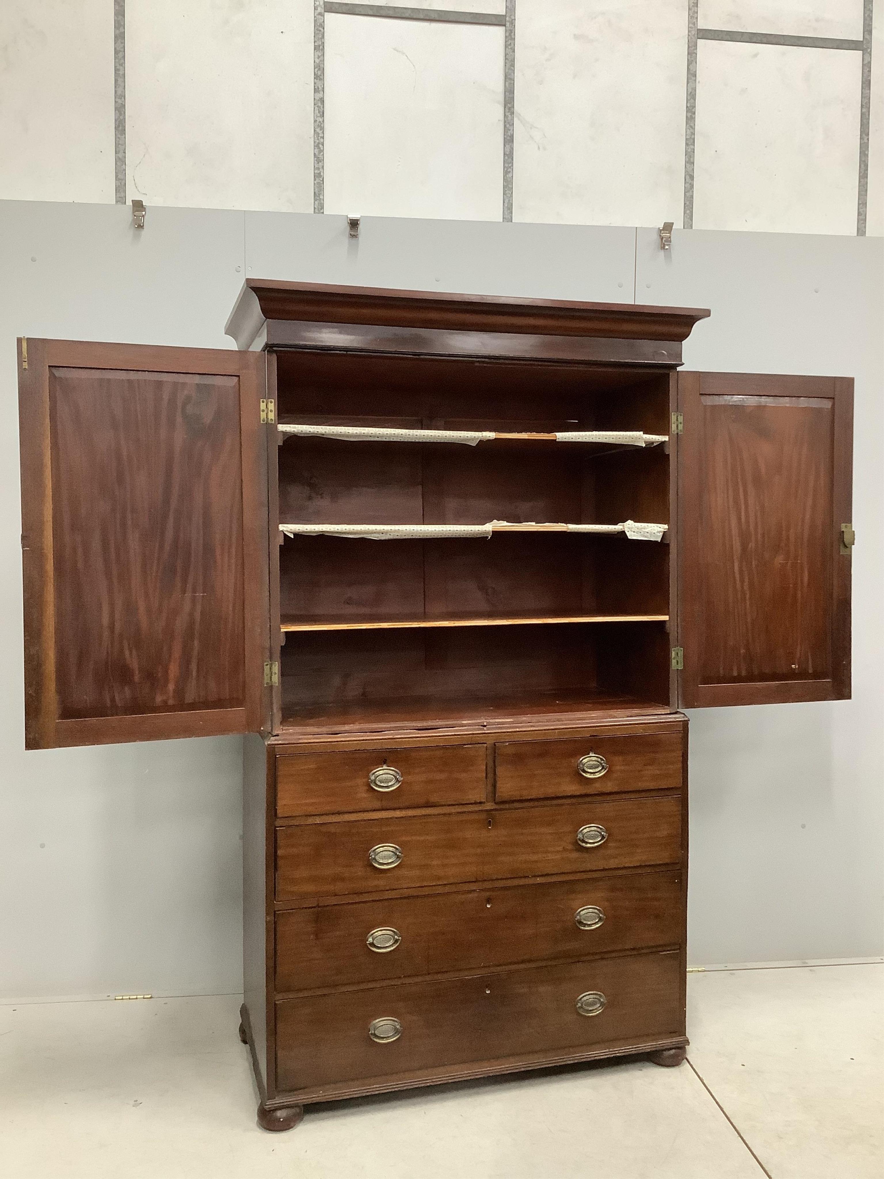 A Regency mahogany linen press, width 114cm, depth 53cm, height 200cm. Condition - poor